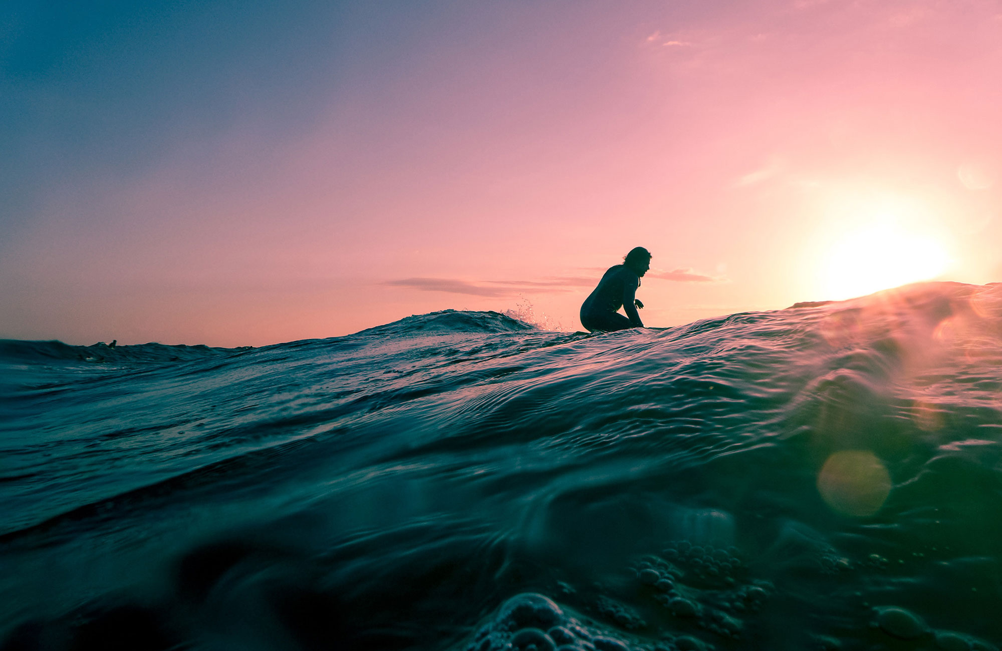 surfing-sunset-wave-water