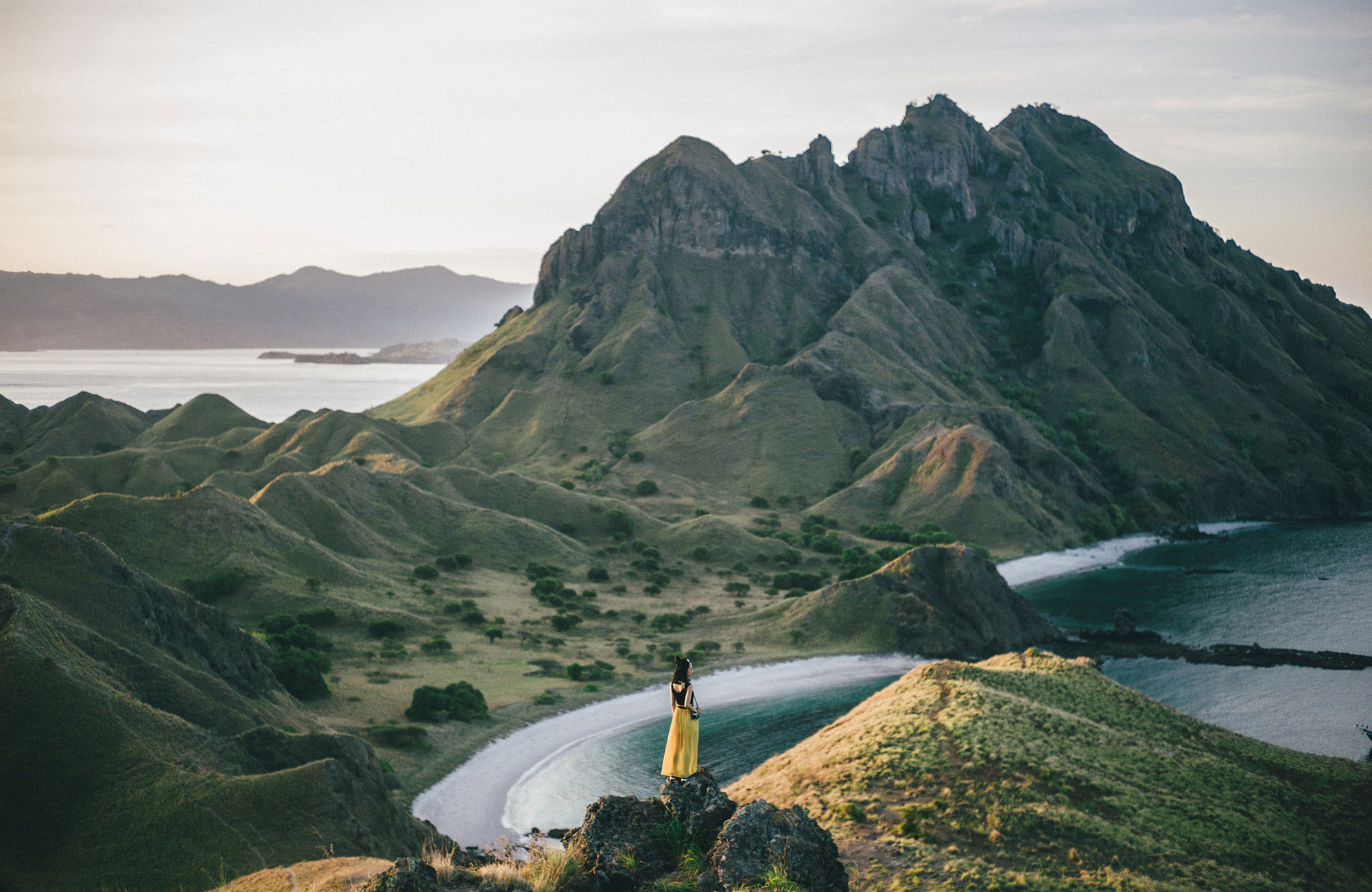 padar-island-indonesia-girl-hill-beach-view-bluehour-cover