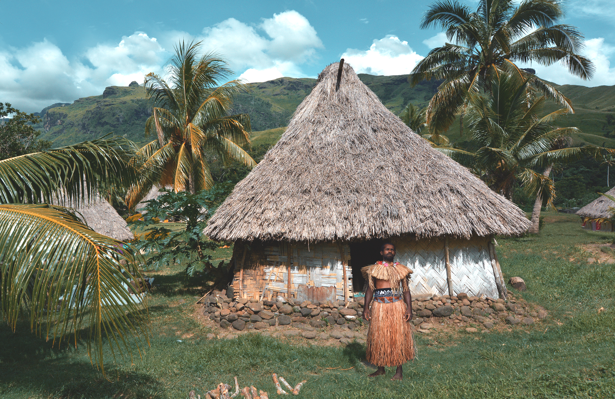 viti-levu-fiji-man-local-costume-bure-hut