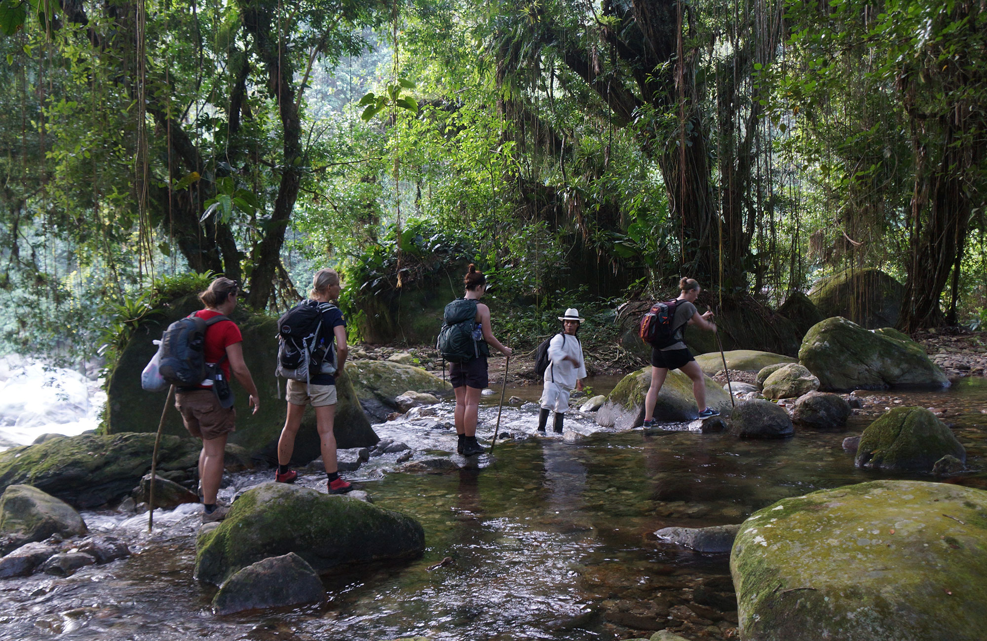 trekking-colombia-lost-city-crossing-a-stream
